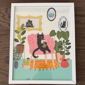 Framed Print with Lounging Black Cat by Sapna Shah